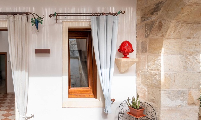 Martano Apartment | Apartment 'Corte Curatolo - Ciuri' with Shared Terrace, Wi-Fi and Air Conditioning