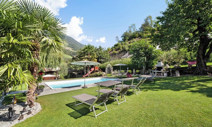 San Leonardo in Passiria Apartment | Apartment "Flieder" with Mountain View, Pool, Wi-Fi, Balcony & Garden