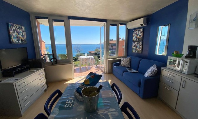 Solarolo Apartment | Apartment "Front Lake Amazing View" Near Lake with Pool, A/C & Wi-Fi