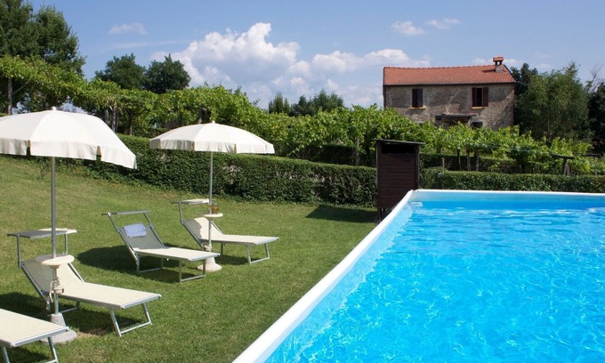 Casalfiumanese Apartment | Apartment in Sassoleone with Pool, Balcony & Garden
