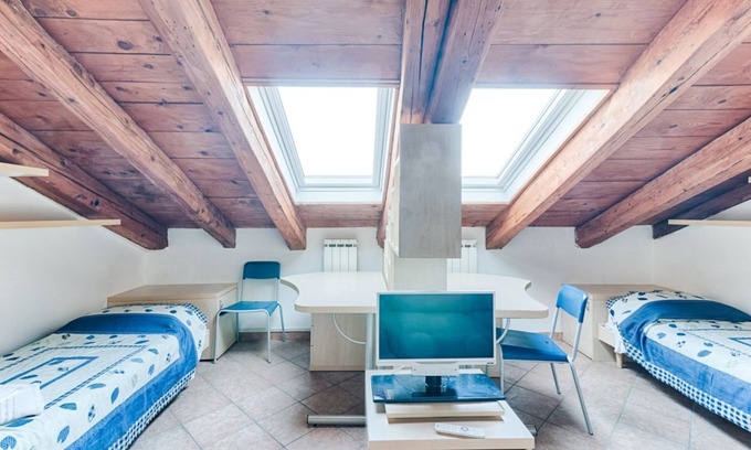 Barriera Vecchia-San Giacomo Apartment | Apartment located on the fifth floor of a building with a lift (there are 10 internal steps at the entrance to the apartment).In 45 sqm it comfortably accommodates 3 people, with a bedroom with two single beds and a sofa bed.Convenientlyt location and eq