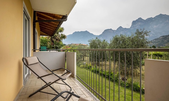 Torbole sul Garda Apartment | Apartment 'N2 Appartamento Rosa' with Mountain View, Shared Garden and Balcony