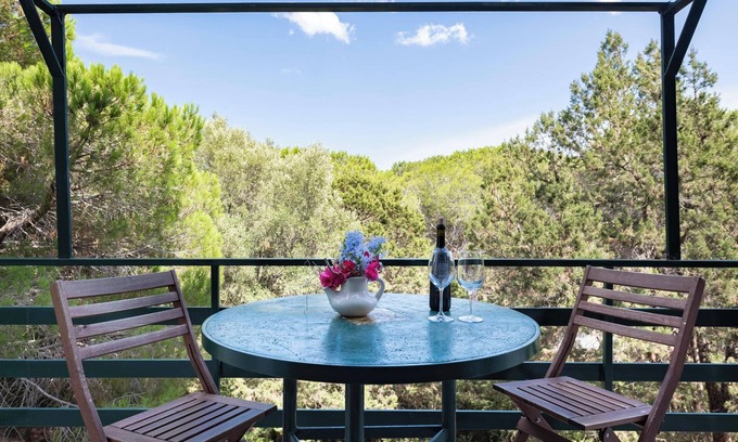 Cala Gonone Apartment | Apartment 'Oriente' with Private Terrace, Wi-Fi and Air Conditioning