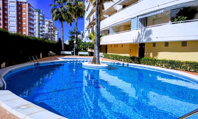 Grau i Platja Apartment | Apartment Playa Gandia-pool-air conditioning-Internet 100Mb-Only Families