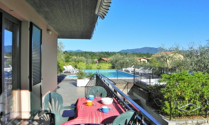 Manerba del Garda Apartment | Apartment with swimming pool and soccer field parking lot with gate