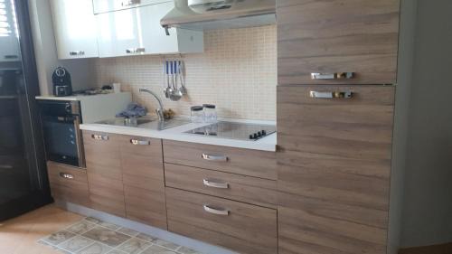 Sant'Ilario dello Ionio Apartment | Appartamento Fronte Mare Rosa 2