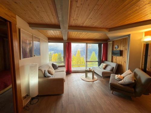 Marilleva 900 Apartment | Appartamento panoramico con vista sulle montagne e accesso diretto alle piste