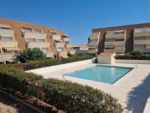 Marseillan Apartment | Appartement en rez-de-jardin avec piscine, accès plage et parking privé - 4 couchages - FR-1-387-155