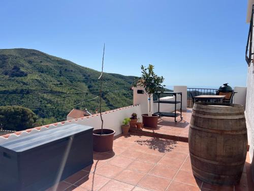 Polopos Apartment | Appartement met airco en dakterras met zicht op zee en bergen