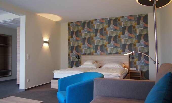 Bramsche Apartment | Appartement mit Südbalkon, Klimaanlage und Schwimmbad + Sauna im Haus