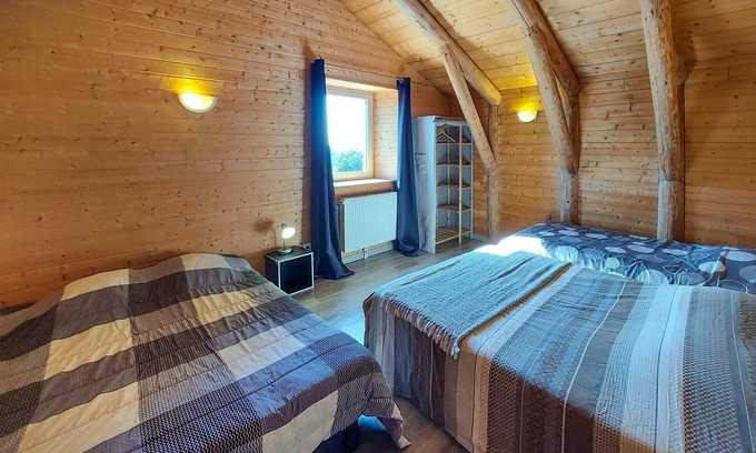Vielprat House | Attractive vacation home made of wood and stone with space for the whole family.