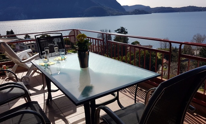 Susello Apartment | Attractive 3½ room apartment with 2 balconies, pool and dream lake view