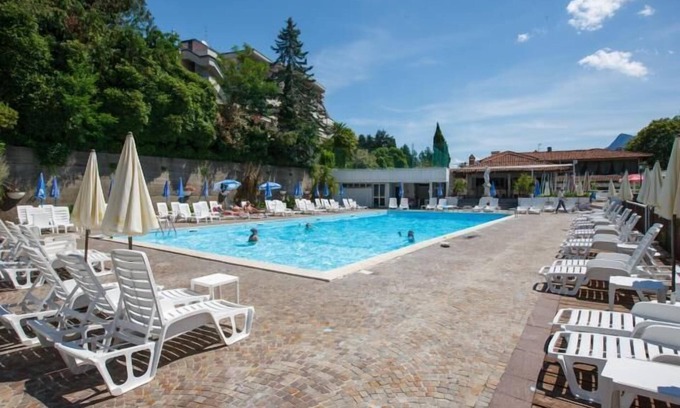 Susello Apartment | Attractive studio with terrace and garden, pool and dream view