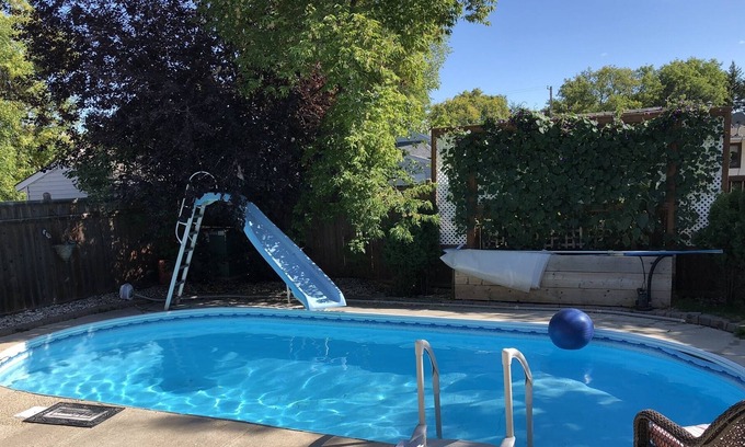 St. Vital House | Backyard oasis awaits. Enjoy your stay.