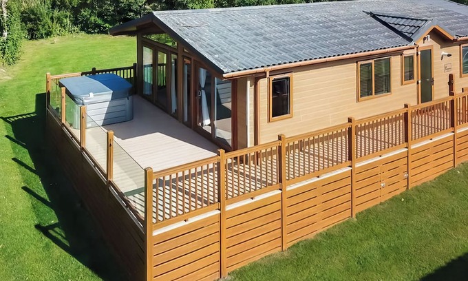 Llansantffraed Ski Chalet | Bay view lodge offers just that, breathtaking views of Ceredigion Bay.