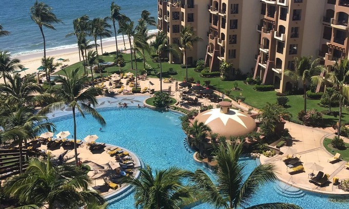 Flamingos Condo | Beach front condo with beautiful pools and hot tubs