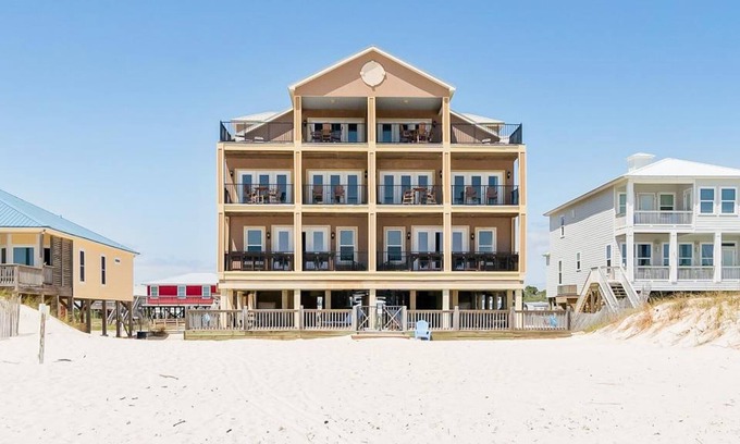 Fort Morgan House | Beachfront wedding/event venue duplex with private pools, elevators, and suites