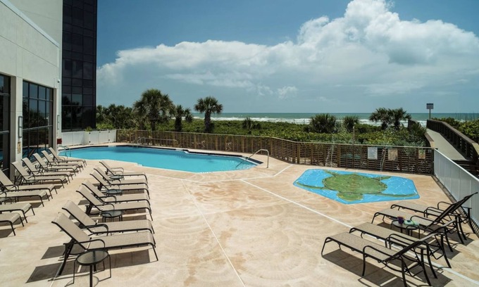 Cocoa Beach Hotel | Beachside Elegance in Cocoa Beach! Pool! Water Sports Activities Onsite!