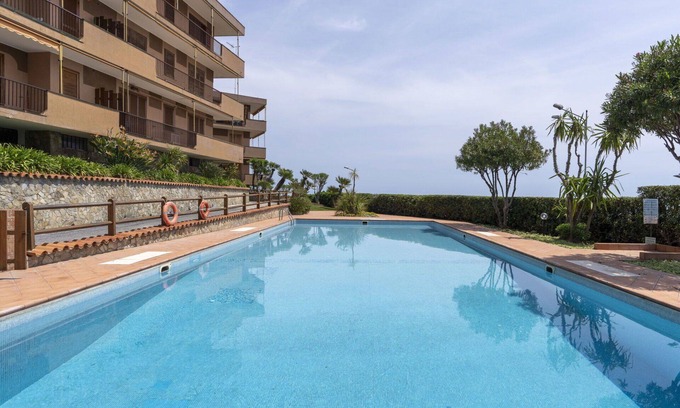 Santo Stefano al Mare Apartment | Beautiful apartment for 4 guests with WIFI, A/C, pool, TV and balcony