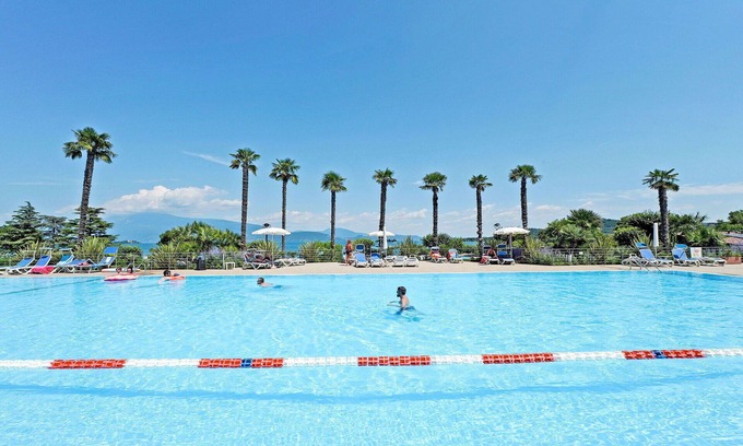 Manerba del Garda Apartment | Beautiful apartment for 5 guests with A/C, WIFI, pool, TV, terrace and pets allowed