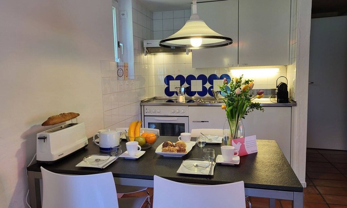 Capriasca Apartment | Beautiful apartment for 5 people with WIFI, pool, TV, patio and pets allowed