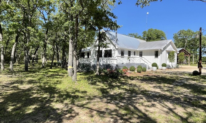 Flatonia House | Beautiful Private Country Home on 23 acres. Sleeps 9. Pond, dock, hiking trails.