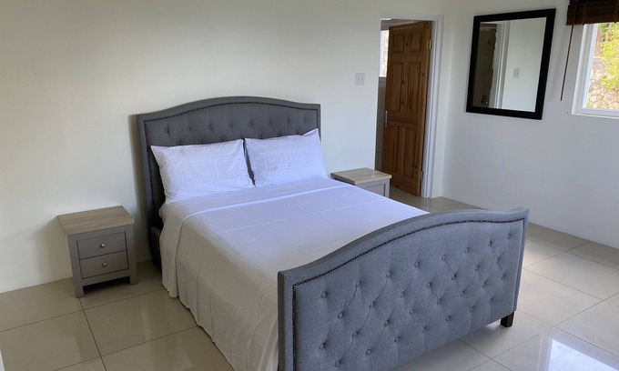 IronShore Estates Apartment | Beautiful sea view flat in coral gardens 10 min fr airport 15 min fr night life