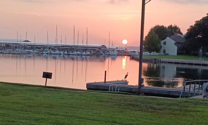 Walden on Lake Conroe Apartment | Beautiful sunrises waterfront condo with boat docking on backyard