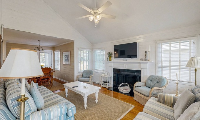 Pelican Bay House | Beautifully decorated cottage steps from the beach with pool & open layout