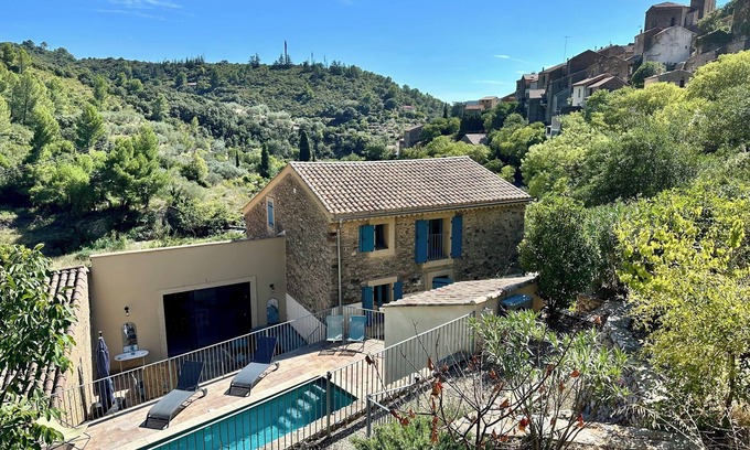 Roquebrun House | Beautifully restored wine grower’s house with pool in stunning riverside village