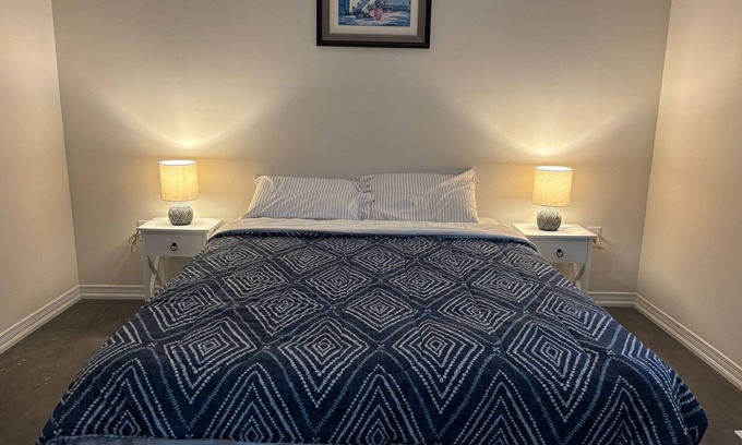 Thorold House | Bedroom Ensuite (Unit 1) @Welland, ON…a cozy bedroom space with jacuzzi