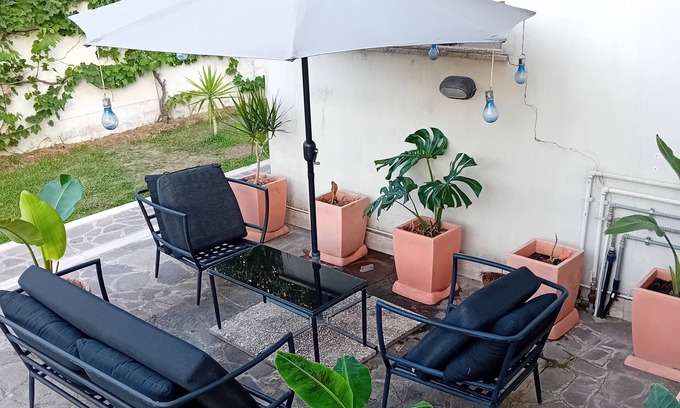 Zona XXX Castel Fusano Apartment | BIBI HOUSE surrounded by greenery