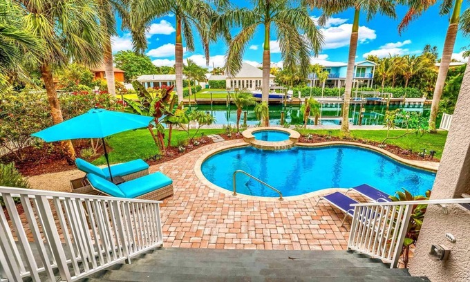 Anna Maria House | Bikini's & Martini's Waterfront Canal: 1 Block to Beach! Dock! On Canal! Anna Maria Life