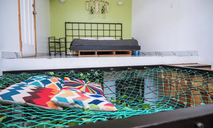 Primera Seccion House | Bottle House