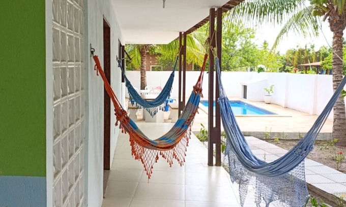 Loteamento Enseada dos Golfinhos House | Beach, pool and barbecue with tranquility and privacy a hundred meters from the sea!