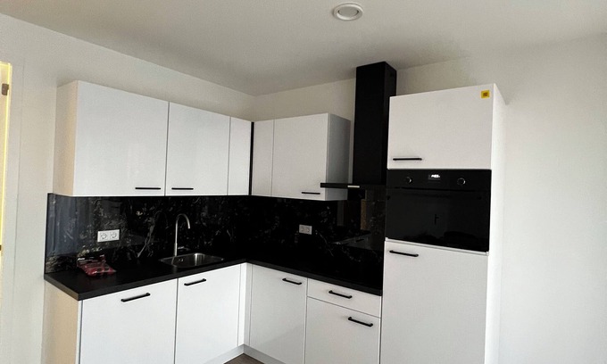 Goirle Apartment | Bright and cozy stay with parking, WiFi, and modern amenities near scenic spots. Sleeps four guests.