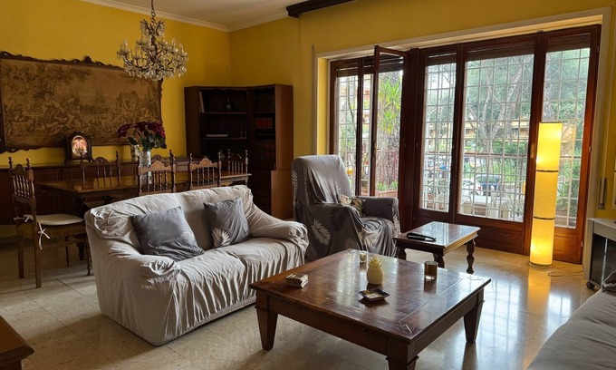 Quartiere XX Ardeatino Apartment | Bright apartment overlooking a characteristic square