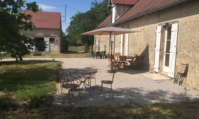 Meillard Cottage | Bright cottage with shared pool and private garden