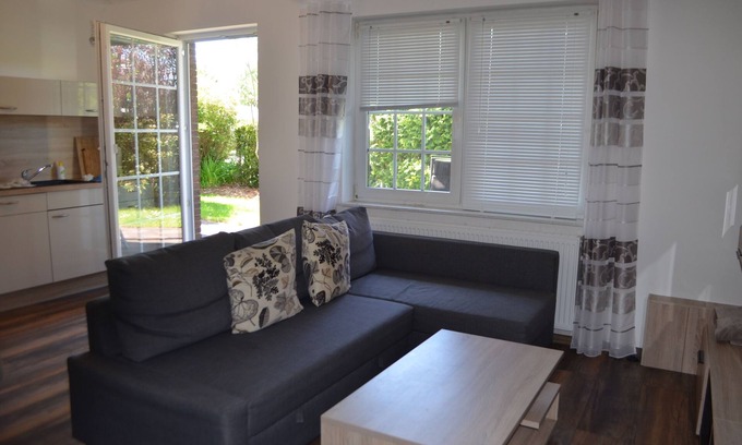 Wangerland Apartment | Bright, spacious comfort apartment with private garden and walk-in shower.