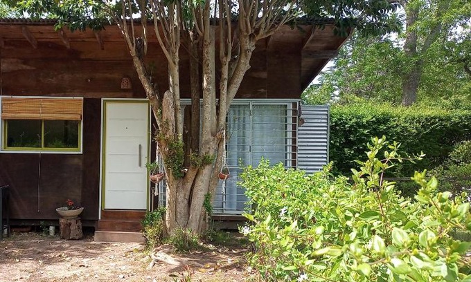 Villa Elisa Apartment | Cabaña monoambiente con pileta y jardín arbolado