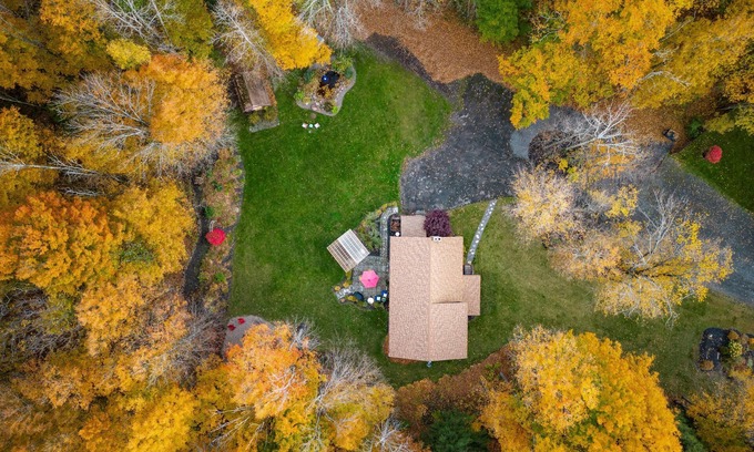 Warren Cabin | Cabin rental with Hot Tub, Fire Pit, mini fountain pond, hammocks, corn hole.