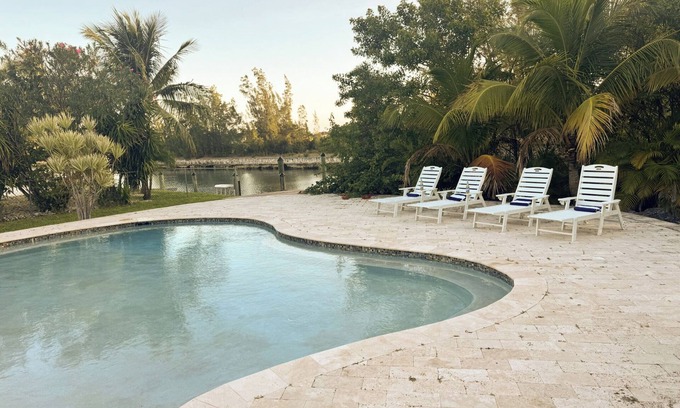 Smith's Point House | Canal home with pool Taino beach just blocks away