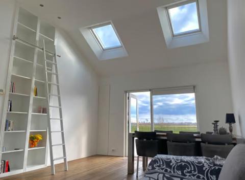 Berkhout House | Canal Side Cozy Home w/ Wood Burning Fireplace