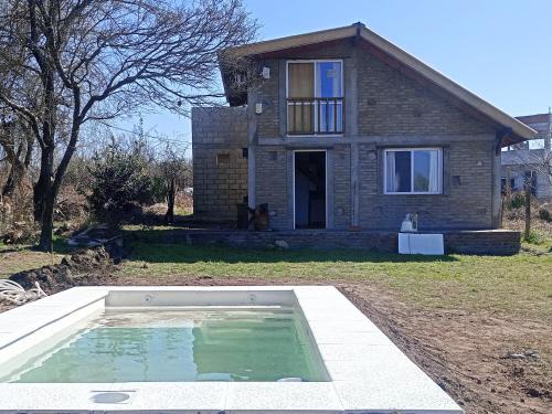 Villa Del Dique Apartment | Chalet y Cabaña de montaña Esmeralda