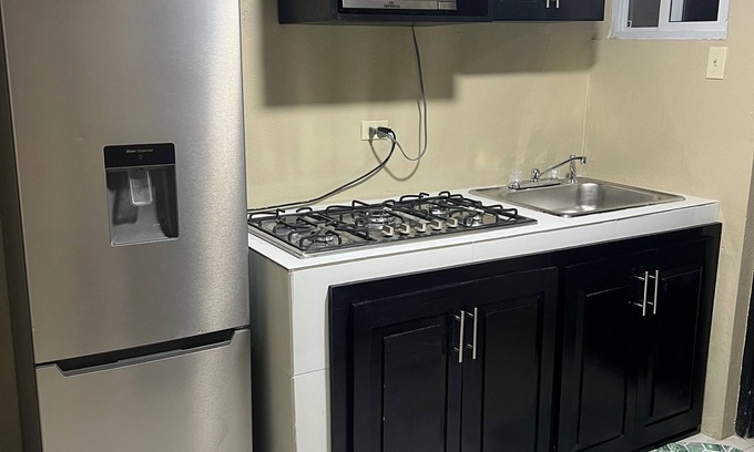 Constant Spring Apartment | Charming 1-bedroom apartment in Kingston with WiFi and AC