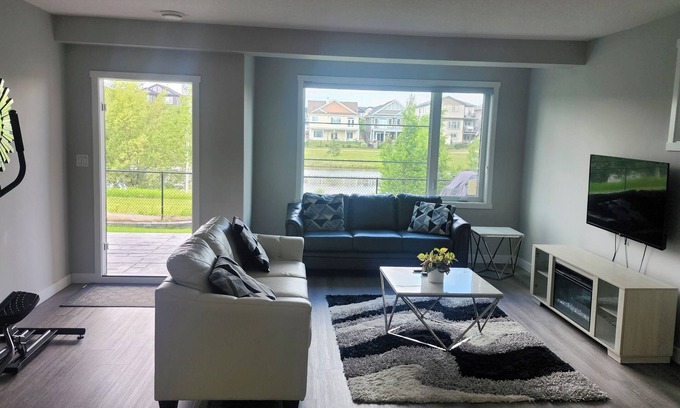 Beaumont House | Charming 1-bedroom walkout pond backing suite with fitness machine, AC and bbq