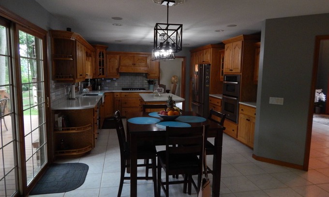 Jamaica Bay House | Charming 2-bedroom home with air-conditioned lanai and two car carport,