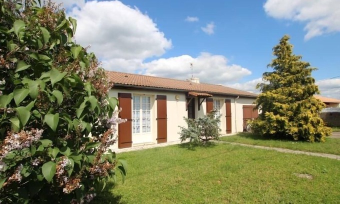 Saint-Denis-du-Payre Cottage | Charming 70s Renovated House with Garden, Bikes, and Close to Nature Reserve