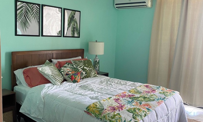 Discovery Bay Condo | Charming beach front condo, Freeport ,Coral Beach, with AC/WiFi, salon/spa, pool