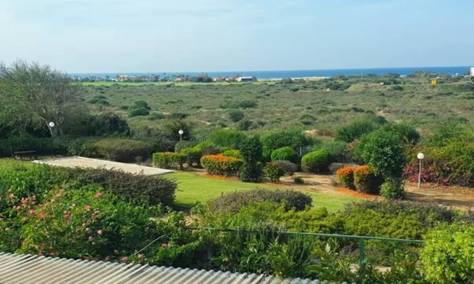 Caesarea Cottage | Charming cottage with garden and sea view in area with gym and pool in Caesarea